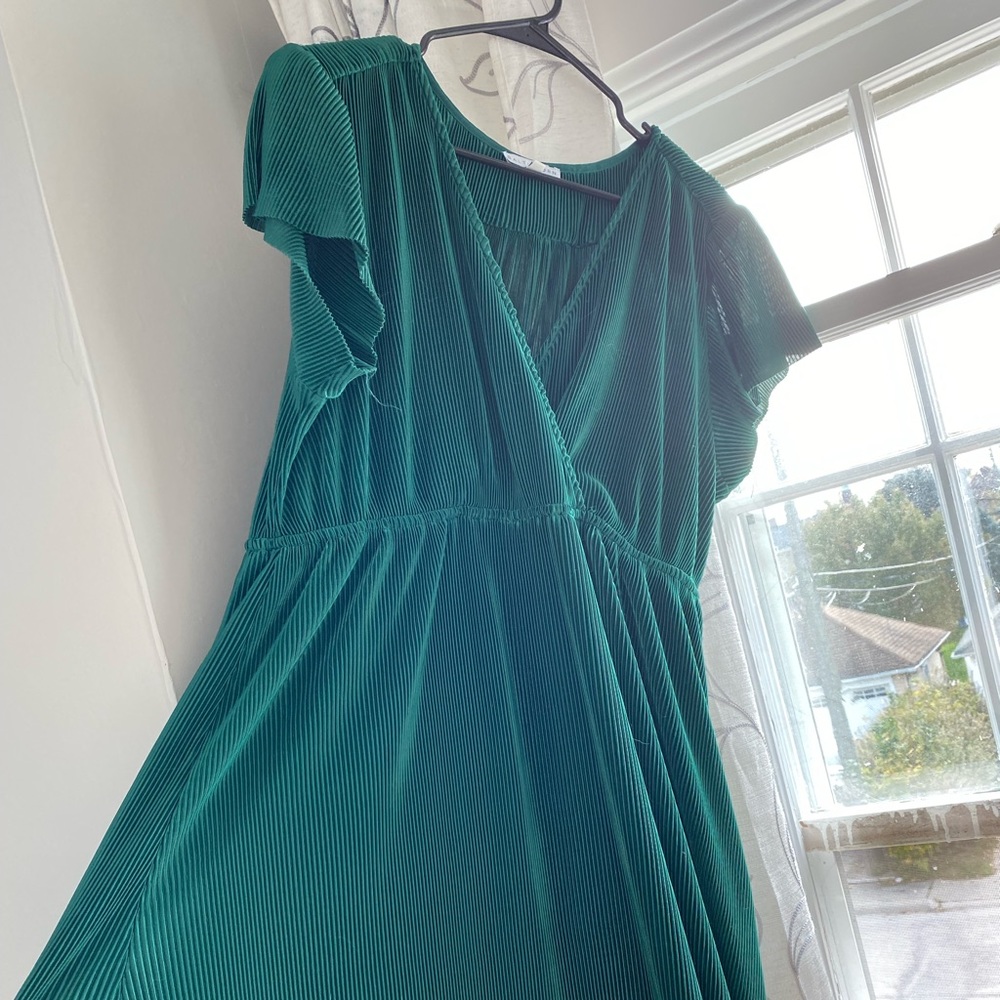 Worn once and cleaned, XXL.